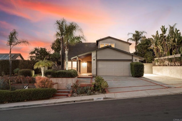 11052 Madrigal St, San Diego, CA 92129 - view of front of home with concrete driveway and an attached garage
