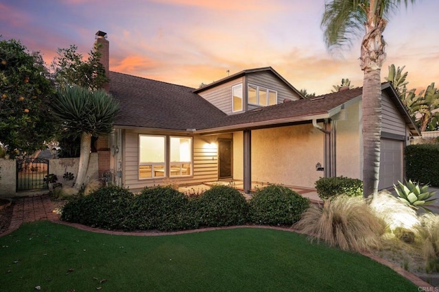 11052 Madrigal St, San Diego, CA 92129 - view of front facade with an attached garage, a gate, a chimney, stucco siding, and roof with shingles