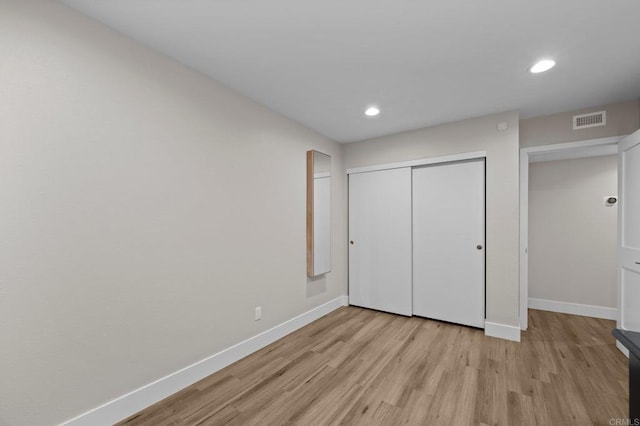 11052 Madrigal St, San Diego, CA 92129 - unfurnished bedroom with recessed lighting, light wood-type flooring, and a closet