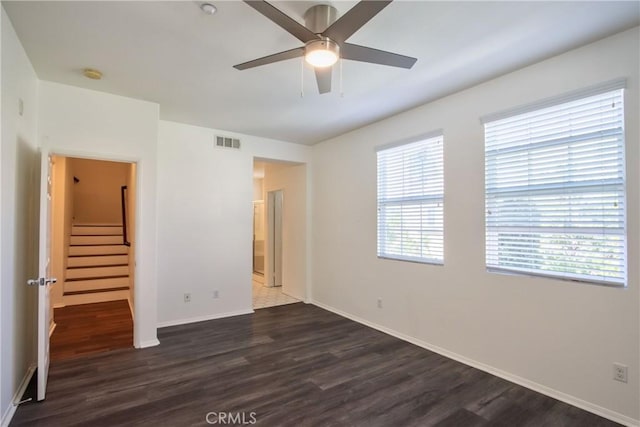 44939 Bellflower Ln Unit 118, Temecula, CA 92592 - unfurnished bedroom featuring dark wood finished floors and a ceiling fan