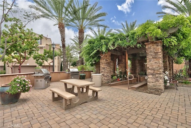 44939 Bellflower Ln Unit 118, Temecula, CA 92592 - view of patio / terrace with exterior kitchen