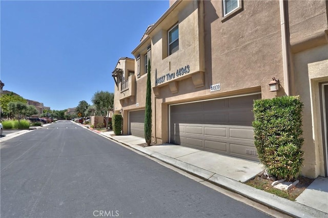 44939 Bellflower Ln Unit 118, Temecula, CA 92592 - view of asphalt street featuring curbs and a residential view