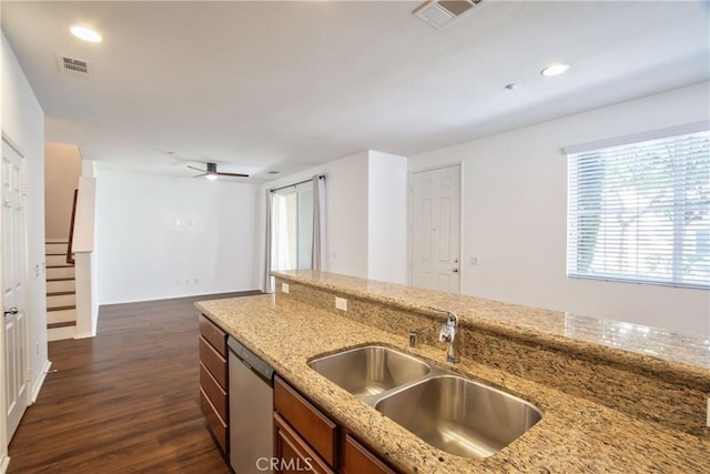 44939 Bellflower Ln Unit 118, Temecula, CA 92592 - kitchen featuring dishwasher, brown cabinetry, dark wood finished floors, ceiling fan, and recessed lighting
