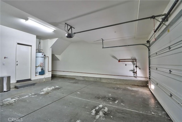 44939 Bellflower Ln Unit 118, Temecula, CA 92592 - garage with secured water heater and a garage door opener