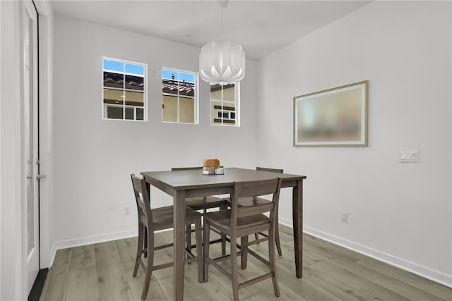 26149 Park Ave Unit 38, Loma Linda, CA 92354 - dining room with wood finished floors and baseboards