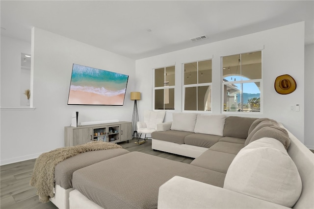 26149 Park Ave Unit 38, Loma Linda, CA 92354 - living room featuring wood finished floors and baseboards