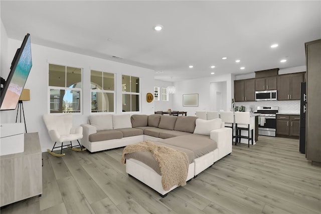 26149 Park Ave Unit 38, Loma Linda, CA 92354 - living area with recessed lighting and light wood-type flooring