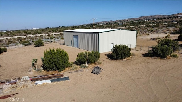 2390 Trinity Rd, Pinon Hills, CA 92372 - view of pole building with view of desert landscape
