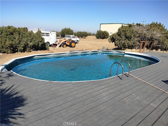 2390 Trinity Rd, Pinon Hills, CA 92372 - outdoor pool featuring a deck