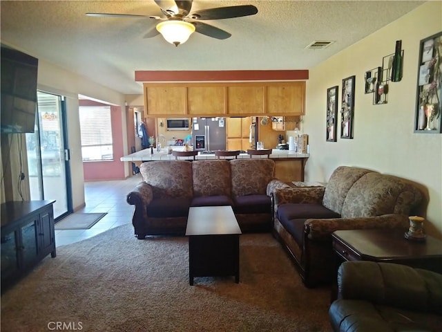 2390 Trinity Rd, Pinon Hills, CA 92372 - living area with a ceiling fan, a textured ceiling, and carpet
