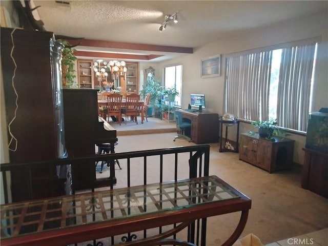 2390 Trinity Rd, Pinon Hills, CA 92372 - carpeted living area featuring a chandelier and a textured ceiling