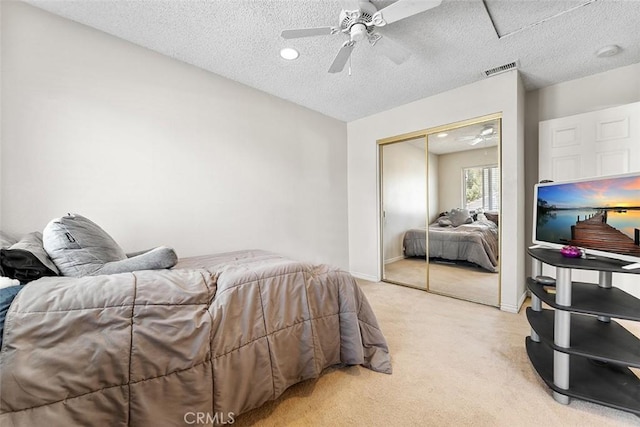 19080 Shakespeare Dr, Walnut, CA 91789 - bedroom with light carpet, a closet, ceiling fan, and a textured ceiling