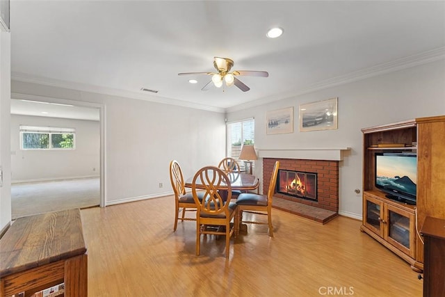 19080 Shakespeare Dr, Walnut, CA 91789 - dining space with ceiling fan, light wood-style flooring, a brick fireplace, healthy amount of natural light, and recessed lighting