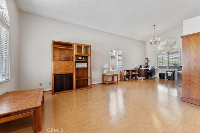19080 Shakespeare Dr, Walnut, CA 91789 - living area with a chandelier, light wood-style flooring, and a desk