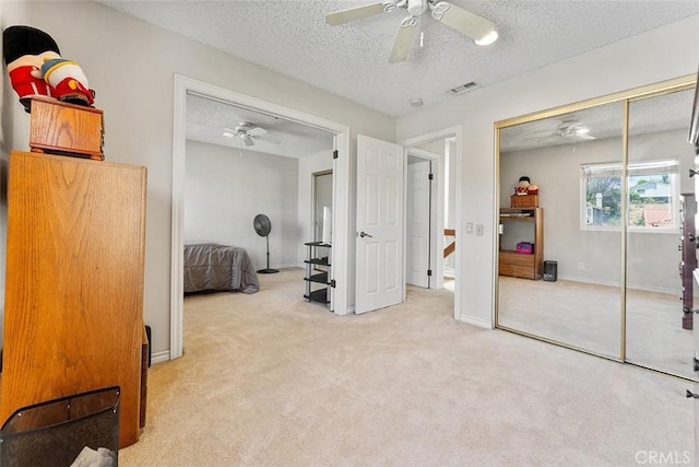 19080 Shakespeare Dr, Walnut, CA 91789 - carpeted bedroom with a textured ceiling, a closet, and a ceiling fan