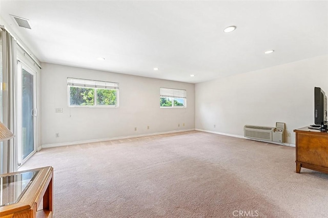 19080 Shakespeare Dr, Walnut, CA 91789 - unfurnished living room featuring light colored carpet, recessed lighting, and a wall unit AC