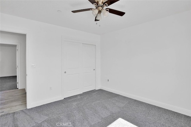 10533 Mohawk Rd, Apple Valley, CA 92308 - unfurnished bedroom featuring carpet, a closet, and a ceiling fan