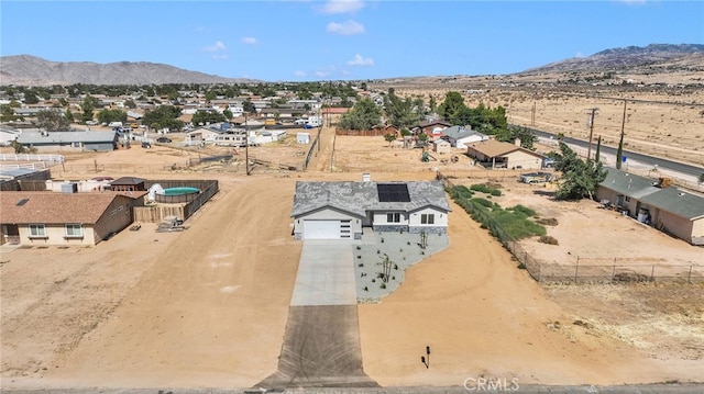 10533 Mohawk Rd, Apple Valley, CA 92308 - aerial view of residential area featuring a mountainous background