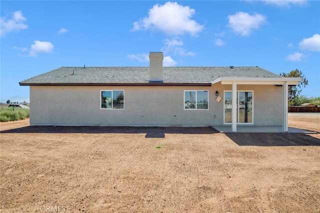 10533 Mohawk Rd, Apple Valley, CA 92308 - back of property with a chimney and a patio area