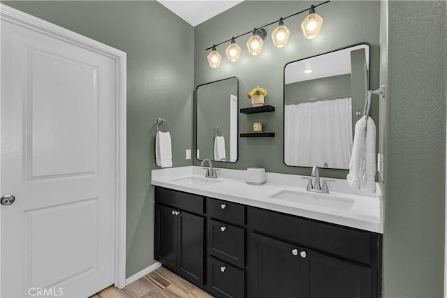 1511 Asteroid Way, Beaumont, CA 92223 - full bathroom with double vanity and wood finished floors
