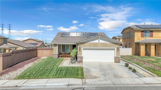 1511 Asteroid Way, Beaumont, CA 92223 - view of front facade with roof mounted solar panels, stucco siding, an attached garage, concrete driveway, and stone siding