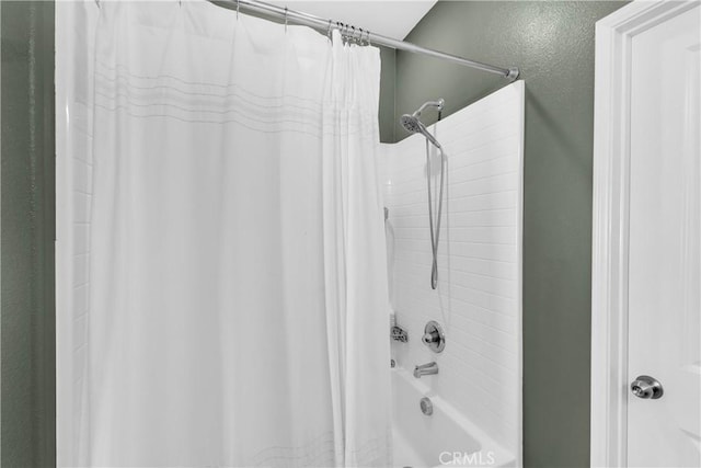 1511 Asteroid Way, Beaumont, CA 92223 - bathroom with shower / tub combo with curtain and a textured wall