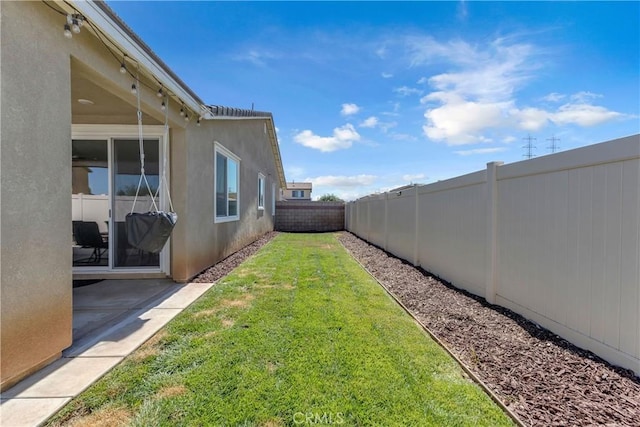 1511 Asteroid Way, Beaumont, CA 92223 - fenced backyard with a patio