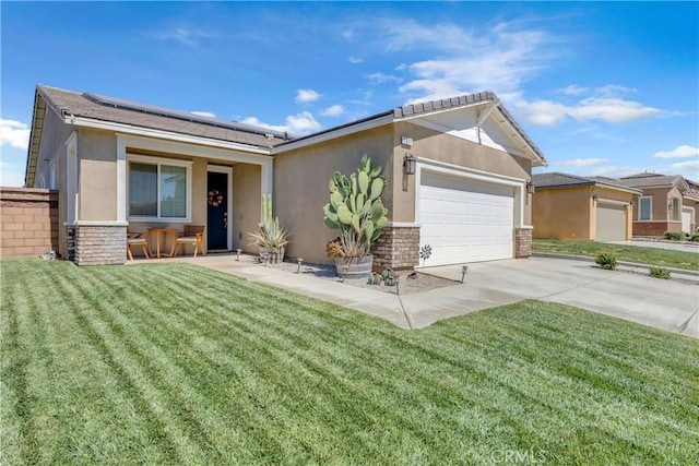 1511 Asteroid Way, Beaumont, CA 92223 - single story home featuring stucco siding, a front yard, an attached garage, driveway, and roof mounted solar panels