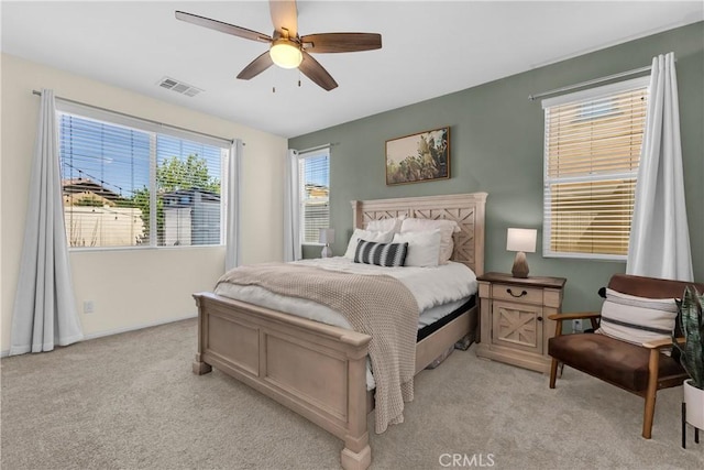 1511 Asteroid Way, Beaumont, CA 92223 - bedroom with light colored carpet and ceiling fan