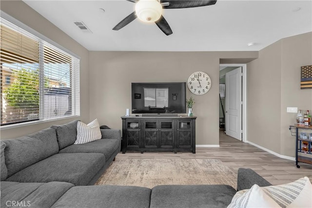 1511 Asteroid Way, Beaumont, CA 92223 - living area with light wood-style floors and a ceiling fan
