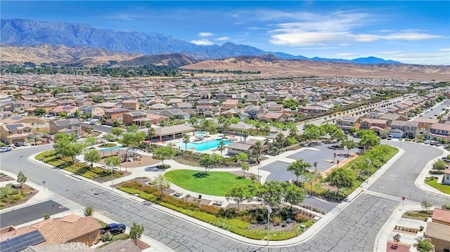 1511 Asteroid Way, Beaumont, CA 92223 - aerial perspective of suburban area featuring a pool and a mountain backdrop