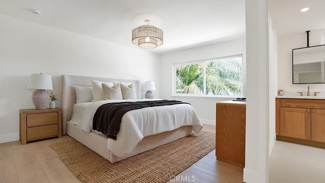 3073 N Pinewood St, Orange, CA 92865 - bedroom featuring light wood-type flooring and recessed lighting