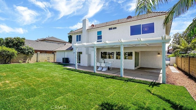 3073 N Pinewood St, Orange, CA 92865 - back of property featuring stucco siding, a chimney, a fenced backyard, a pergola, and a patio area