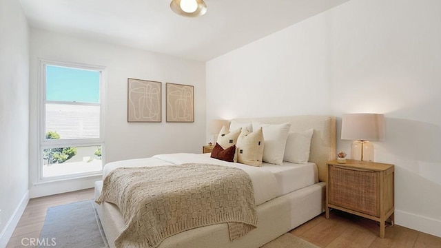 3073 N Pinewood St, Orange, CA 92865 - bedroom featuring light wood finished floors and baseboards