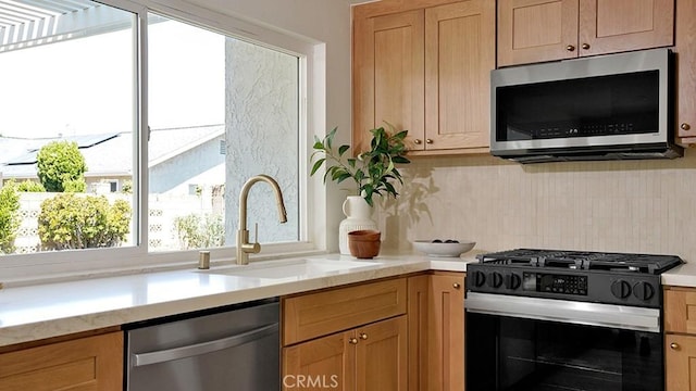 3073 N Pinewood St, Orange, CA 92865 - kitchen featuring stainless steel appliances and backsplash