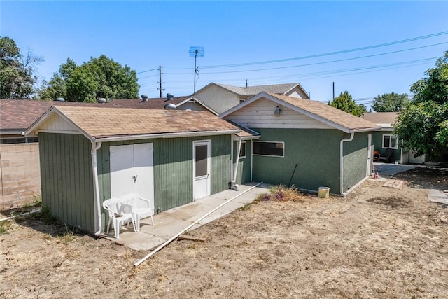 18934 San Bernardino Ave, Bloomington, CA 92316 - back of property featuring a shingled roof