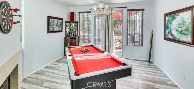 1020 La Salle Cir, Corona, CA 92879 - rec room with wood finished floors, a chandelier, and billiards table