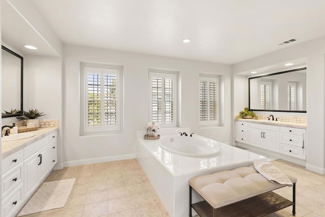 6257 Alverton, Carlsbad, CA 92009 - full bathroom featuring two vanities, a bath, recessed lighting, and tile patterned flooring