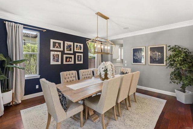 6257 Alverton, Carlsbad, CA 92009 - dining space featuring crown molding, a chandelier, and dark wood-type flooring
