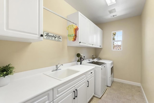 6257 Alverton, Carlsbad, CA 92009 - washroom with washer and dryer, cabinet space, and light tile patterned flooring