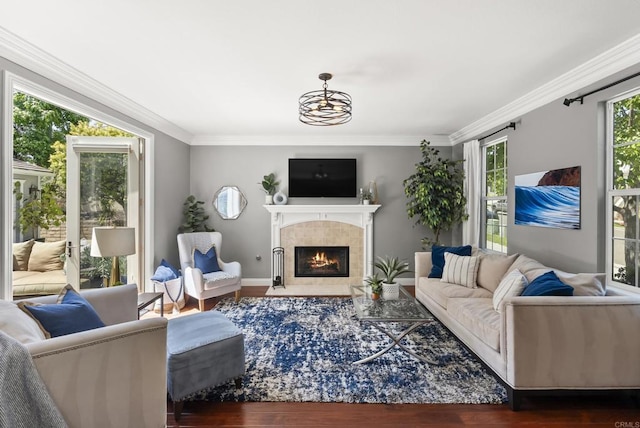 6257 Alverton, Carlsbad, CA 92009 - living room with dark wood-type flooring, a tile fireplace, ornamental molding, and a chandelier