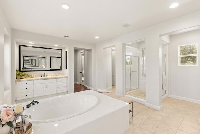 6257 Alverton, Carlsbad, CA 92009 - bathroom with a garden tub, vanity, a stall shower, recessed lighting, and tile patterned flooring