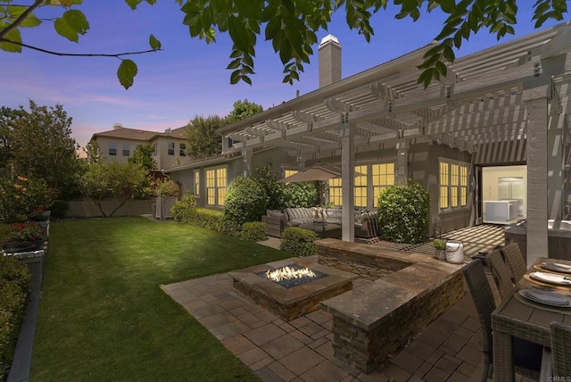 6257 Alverton, Carlsbad, CA 92009 - back of house with a chimney, a patio, an outdoor living space with a fire pit, and a pergola