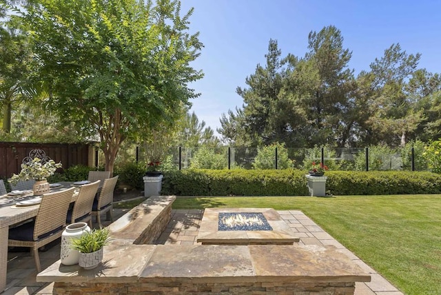6257 Alverton, Carlsbad, CA 92009 - fenced backyard with a fire pit, a patio area, and outdoor dining area