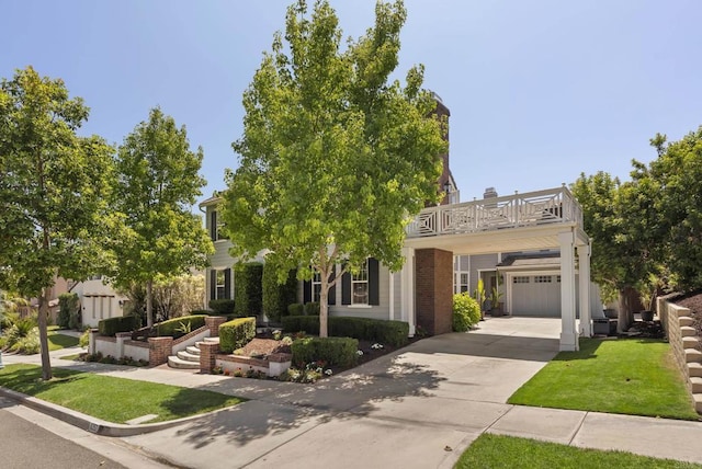 6257 Alverton, Carlsbad, CA 92009 - view of front of home with a garage, driveway, a balcony, a front lawn, and brick siding