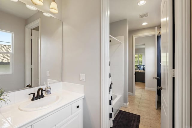6257 Alverton, Carlsbad, CA 92009 - full bath with vanity, washtub / shower combination, tile patterned floors, and recessed lighting