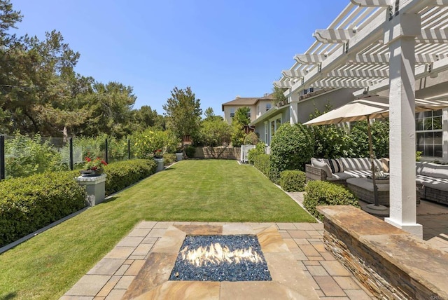 6257 Alverton, Carlsbad, CA 92009 - fenced backyard featuring an outdoor living space with a fire pit, a patio area, and a pergola