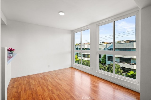 911 N Kings Rd Unit 310, West Hollywood, CA 90069 - spare room with light wood-type flooring and baseboards