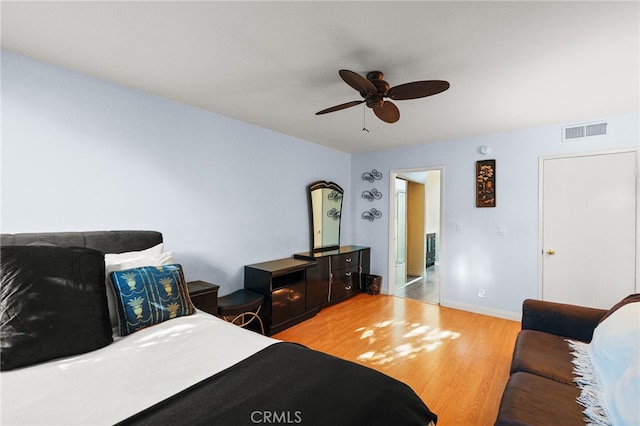 911 N Kings Rd Unit 310, West Hollywood, CA 90069 - bedroom with light wood-style flooring and a ceiling fan