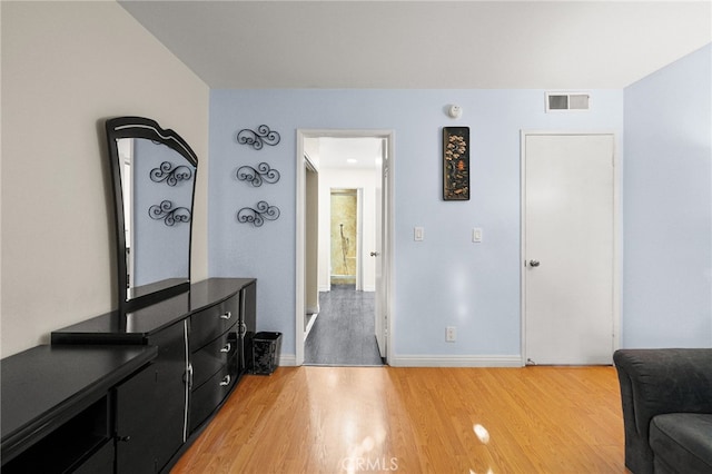 911 N Kings Rd Unit 310, West Hollywood, CA 90069 - living area with light wood-type flooring and baseboards